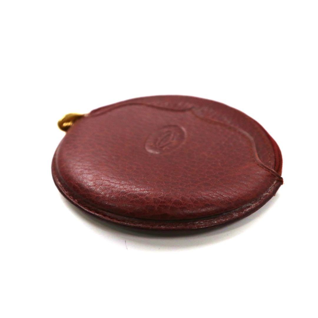 Cartier portamonete bordeaux in pelle con logo impresso, linea Must, pelle martellata, made in Spain