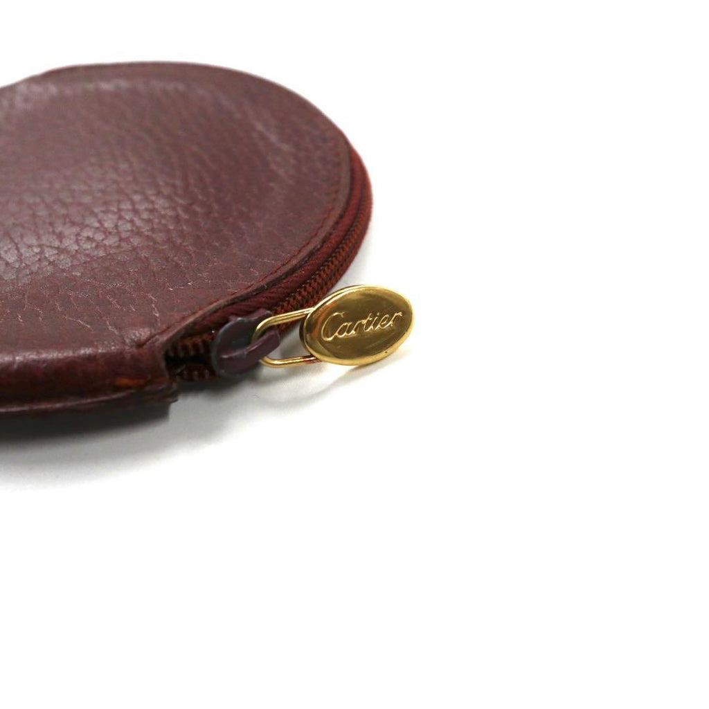 Cartier portamonete bordeaux in pelle con logo impresso, linea Must, pelle martellata, made in Spain