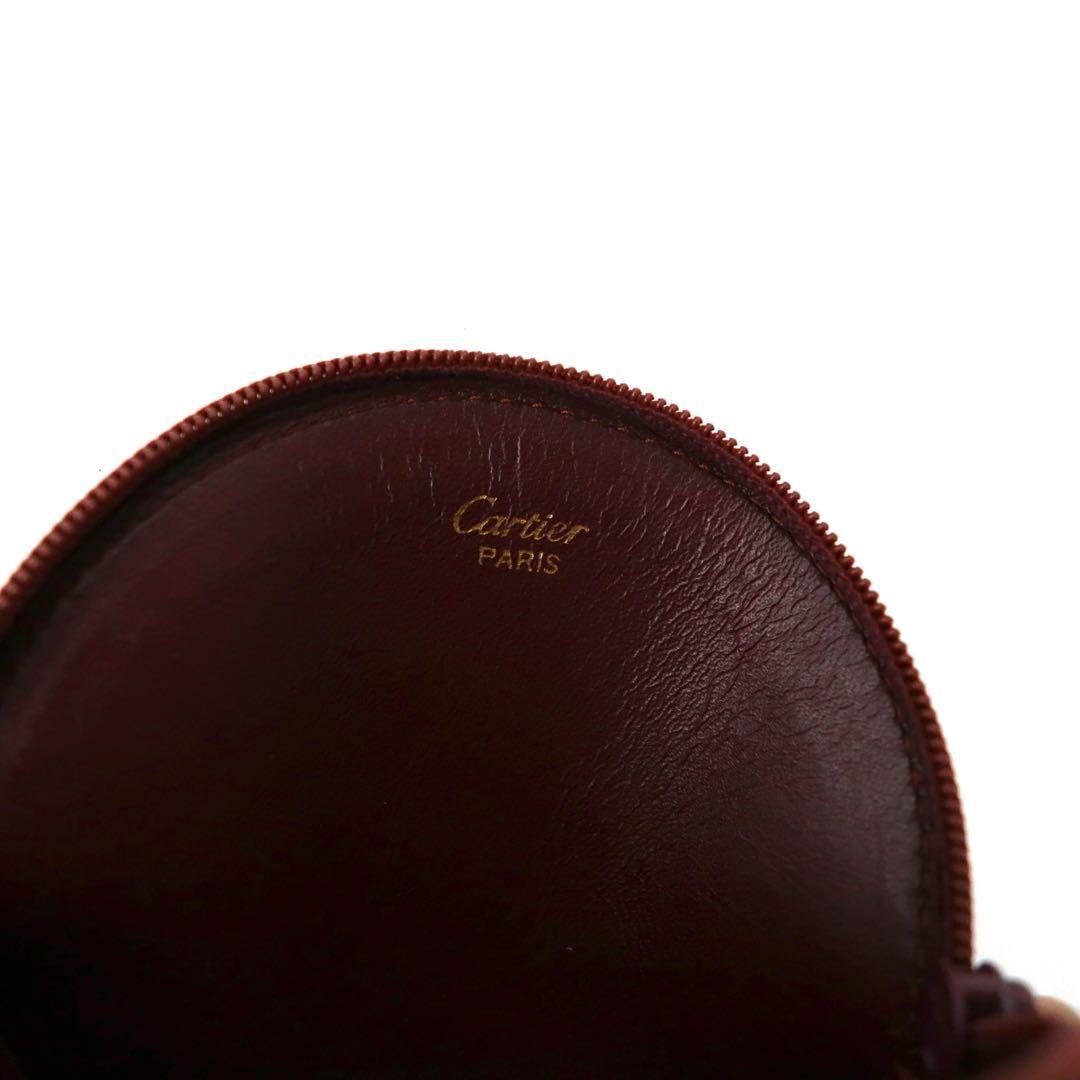 Cartier portamonete bordeaux in pelle con logo impresso, linea Must, pelle martellata, made in Spain