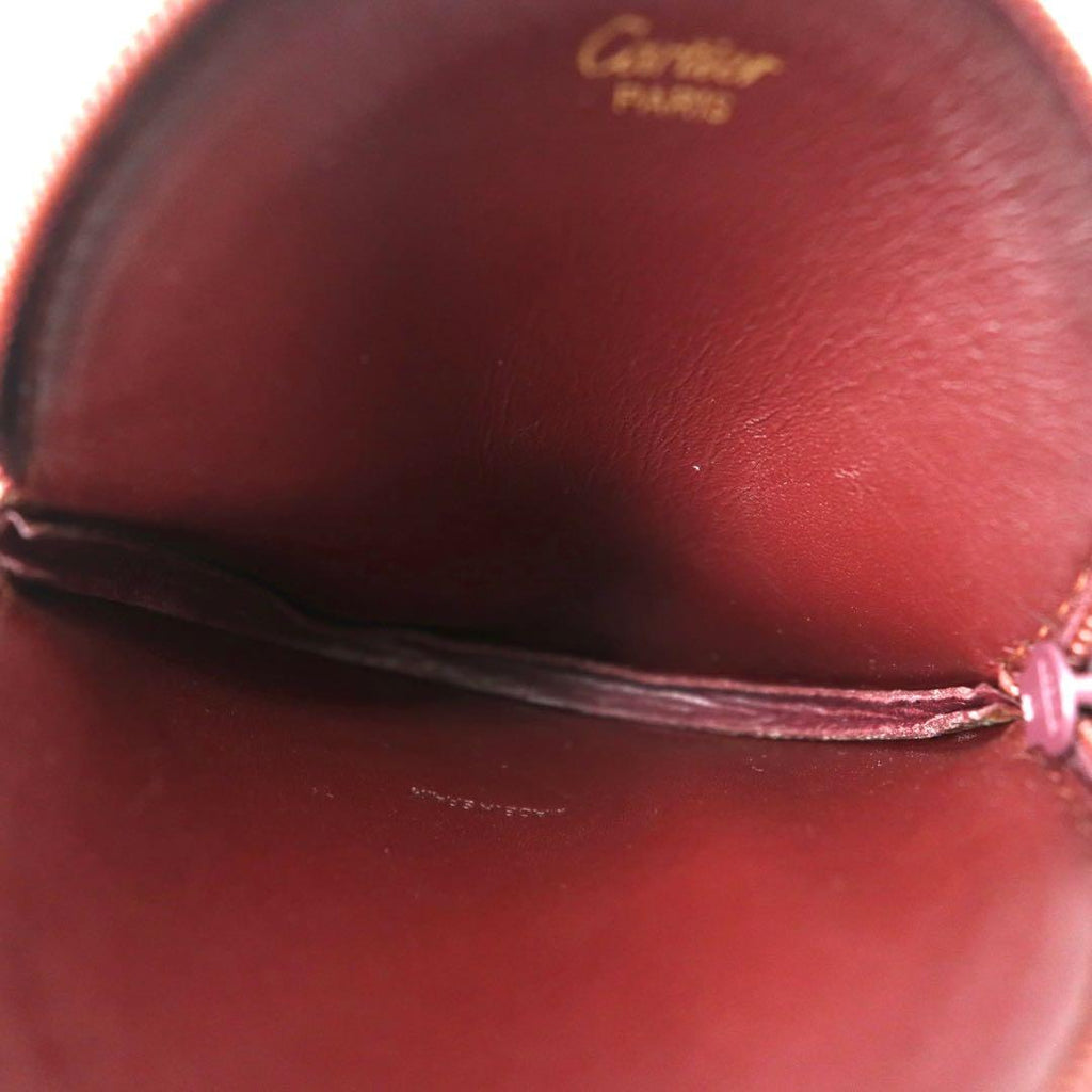 Cartier portamonete bordeaux in pelle con logo impresso, linea Must, pelle martellata, made in Spain