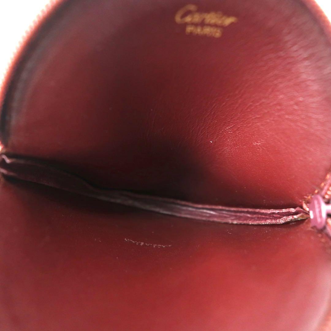 Cartier portamonete bordeaux in pelle con logo impresso, linea Must, pelle martellata, made in Spain